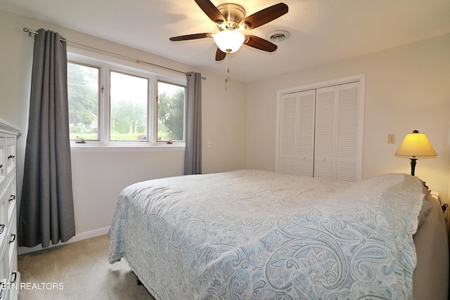 433 Clover Fork Dr, Knoxville, TN 37934 - bedroom with light colored carpet, a closet, and a ceiling fan