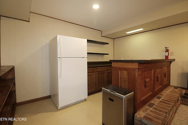 433 Clover Fork Dr, Knoxville, TN 37934 - kitchen featuring freestanding refrigerator, refrigerator, dark countertops, and open shelves