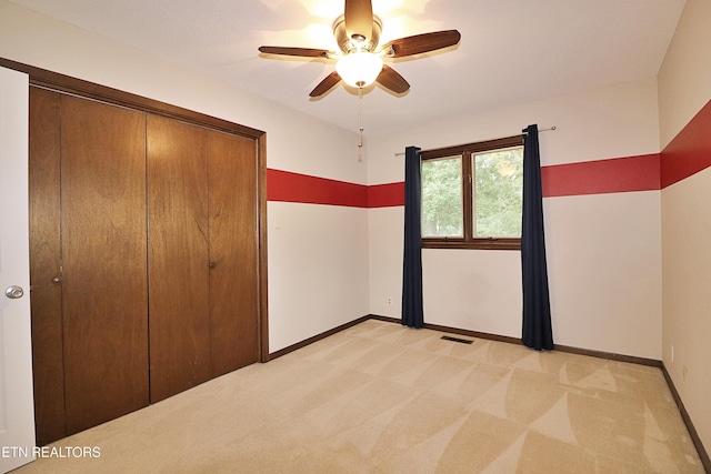 433 Clover Fork Dr, Knoxville, TN 37934 - unfurnished bedroom featuring light colored carpet, a closet, and ceiling fan