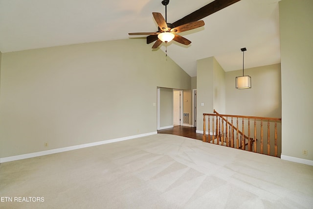 433 Clover Fork Dr, Knoxville, TN 37934 - unfurnished room with dark carpet, a ceiling fan, high vaulted ceiling, and beam ceiling
