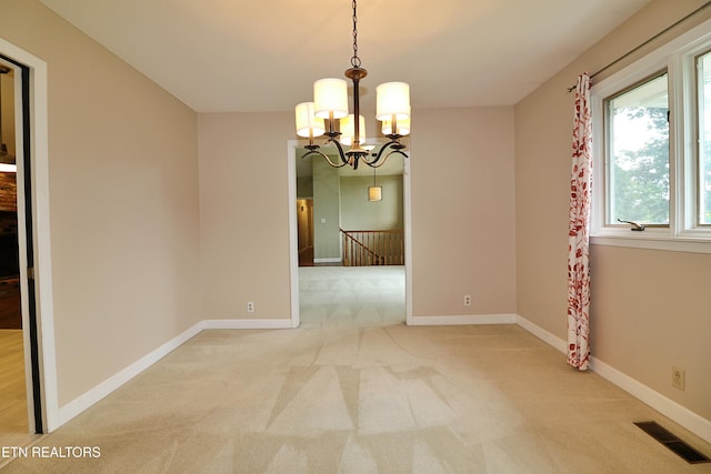 433 Clover Fork Dr, Knoxville, TN 37934 - carpeted empty room with a chandelier and baseboards