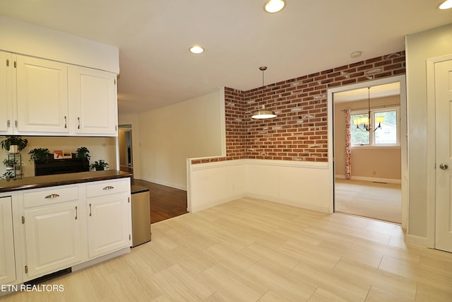 433 Clover Fork Dr, Knoxville, TN 37934 - kitchen featuring white cabinets, dark countertops, wainscoting, decorative light fixtures, and recessed lighting
