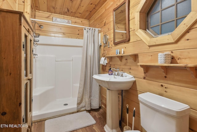 3014 N Clear Fork Rd, Sevierville, TN 37862 - full bath featuring wooden walls, wooden ceiling, a shower stall, and wood finished floors
