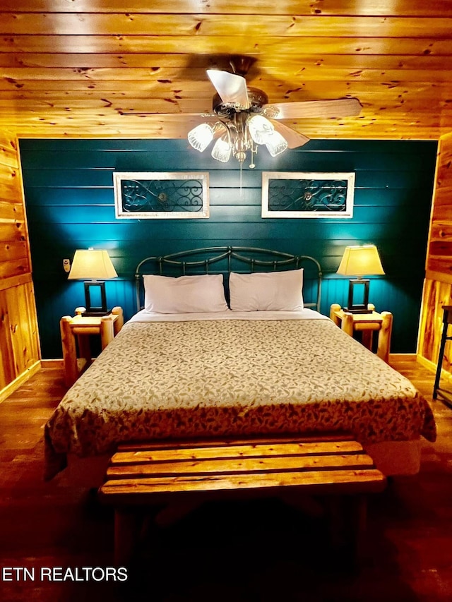 3014 N Clear Fork Rd, Sevierville, TN 37862 - bedroom with wood finished floors, wood walls, and ceiling fan