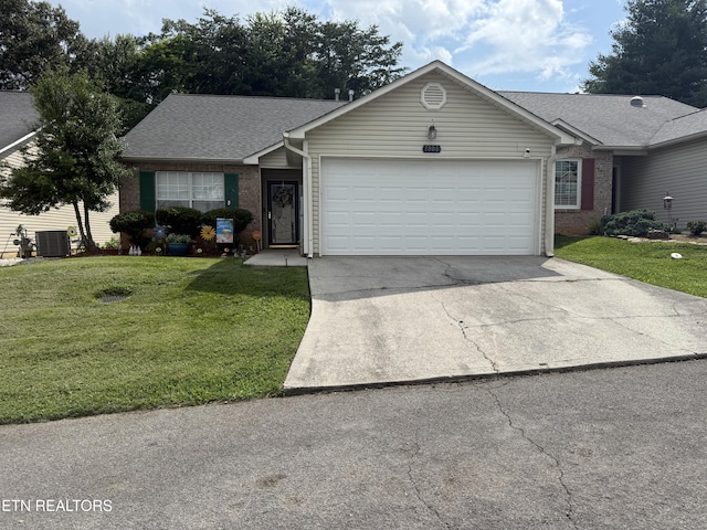 7808 Stone Garden Way, Powell, TN 37849 - ranch-style house with an attached garage, concrete driveway, and brick siding