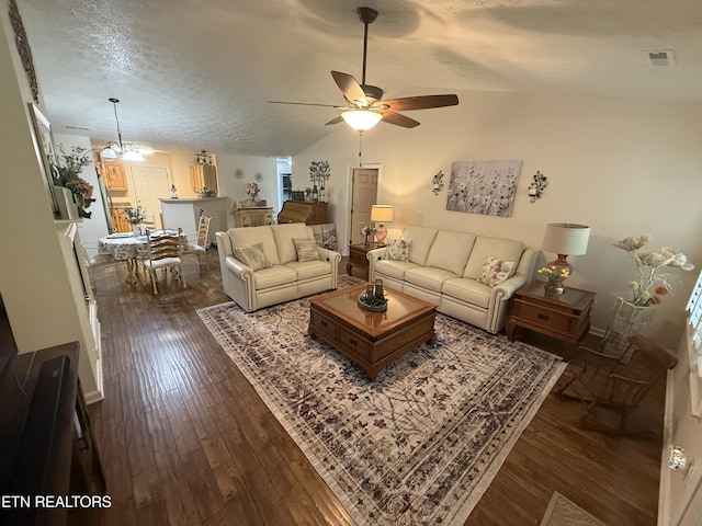 7808 Stone Garden Way, Powell, TN 37849 - living area with dark wood finished floors, ceiling fan, a textured ceiling, and lofted ceiling
