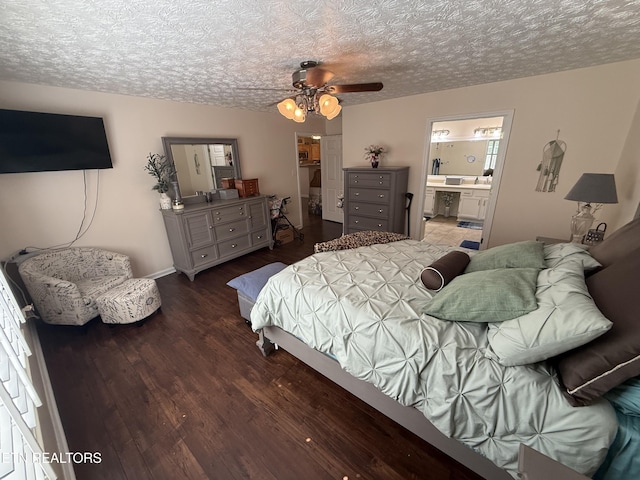 7808 Stone Garden Way, Powell, TN 37849 - bedroom featuring wood finished floors, ensuite bath, a textured ceiling, and a ceiling fan