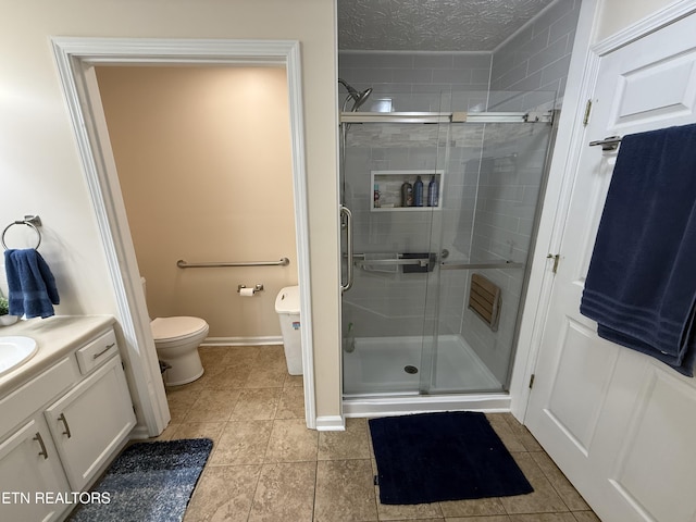 7808 Stone Garden Way, Powell, TN 37849 - full bathroom featuring vanity, a shower stall, and tile patterned flooring