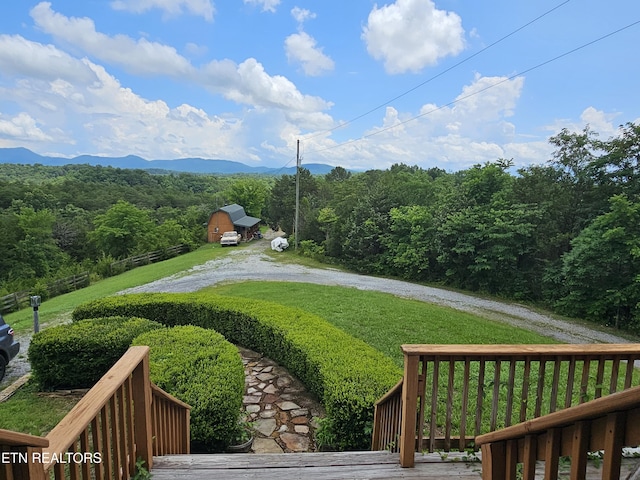 2440 Levee Way, Sevierville, TN 37876 - view of green lawn featuring a wooded view and a mountain view