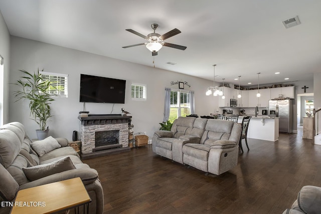 11944 Cordial Ln, Knoxville, TN 37932 - living area featuring a ceiling fan, dark wood finished floors, recessed lighting, and a stone fireplace