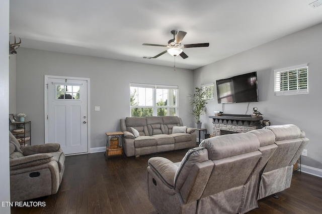 11944 Cordial Ln, Knoxville, TN 37932 - living room with a ceiling fan, healthy amount of natural light, dark wood finished floors, and a stone fireplace