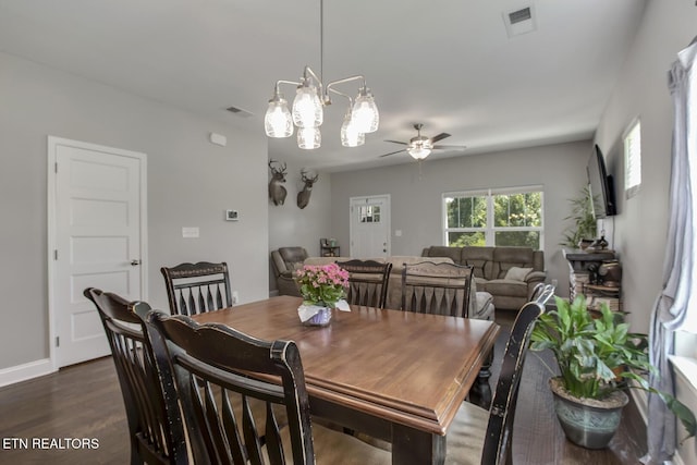 11944 Cordial Ln, Knoxville, TN 37932 - dining area featuring a ceiling fan, dark wood-type flooring, and a chandelier
