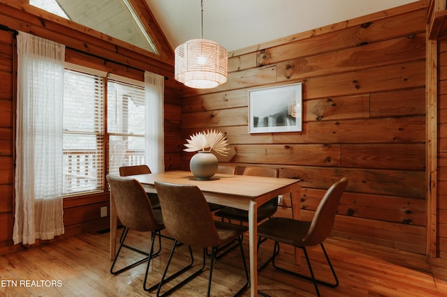 3653 Country Pines Way, Sevierville, TN 37876 - dining area featuring light wood-type flooring and wood walls