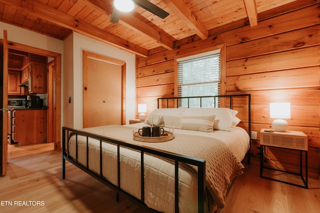 3653 Country Pines Way, Sevierville, TN 37876 - bedroom featuring light wood-type flooring, a wooden ceiling with exposed beams, and wood walls