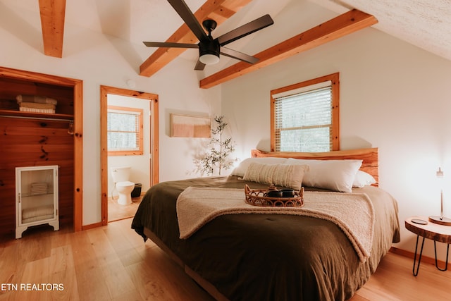 3653 Country Pines Way, Sevierville, TN 37876 - bedroom featuring wood finished floors, multiple windows, and connected bathroom