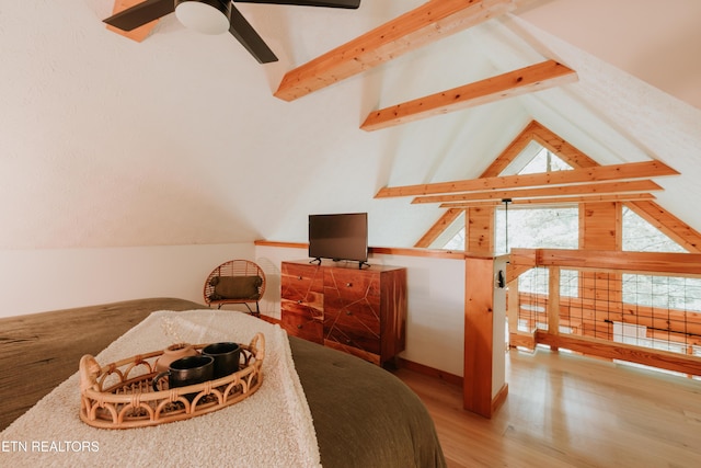 3653 Country Pines Way, Sevierville, TN 37876 - bedroom featuring beam ceiling, wood finished floors, multiple windows, and high vaulted ceiling