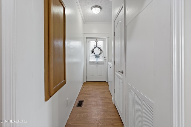 1914 Old Chilhowee Rd, Seymour, TN 37865 - hall featuring light wood-style floors, a textured ceiling, and ornamental molding