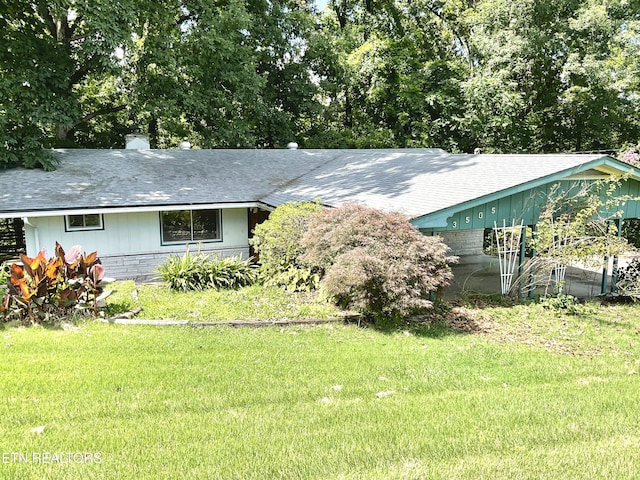 3505 Hackworth Rd, Knoxville, TN 37931 - view of front of home with a front yard and a shingled roof