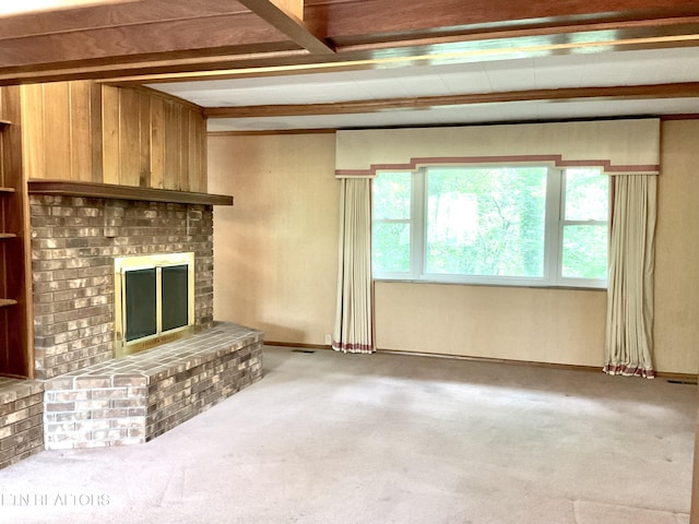 3505 Hackworth Rd, Knoxville, TN 37931 - unfurnished living room featuring a brick fireplace, beamed ceiling, and carpet flooring