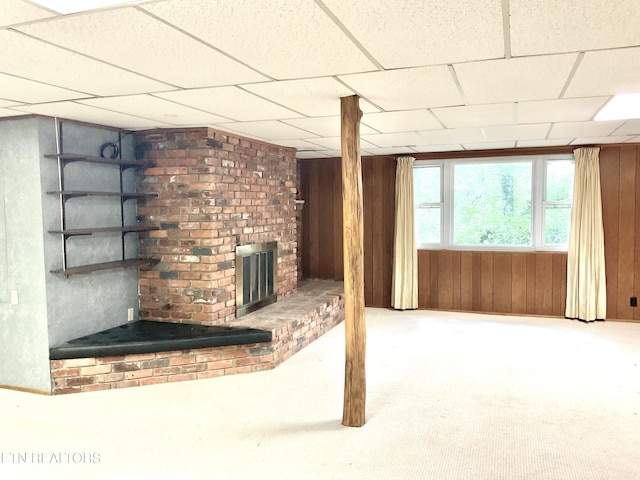 3505 Hackworth Rd, Knoxville, TN 37931 - below grade area with wooden walls, a fireplace, carpet floors, and a paneled ceiling