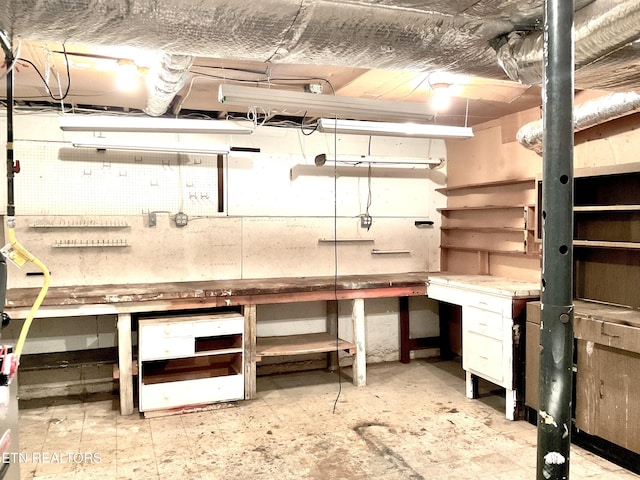 3505 Hackworth Rd, Knoxville, TN 37931 - unfinished below grade area featuring a workshop area
