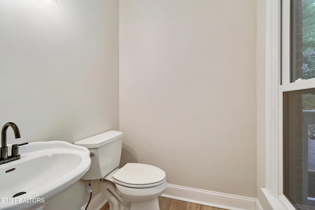 110 Lakecrest Ln, Oak Ridge, TN 37830 - half bathroom featuring a sink and wood finished floors