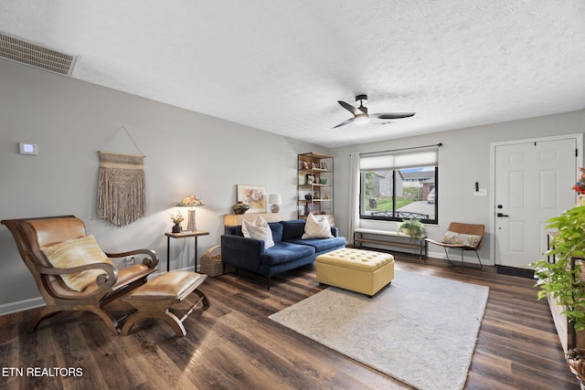 7217 Palermo Rd, Knoxville, TN 37918 - living area featuring ceiling fan, dark wood-style flooring, and a textured ceiling
