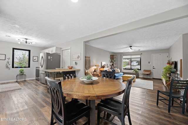7217 Palermo Rd, Knoxville, TN 37918 - dining space featuring a textured ceiling, wood finished floors, and ceiling fan