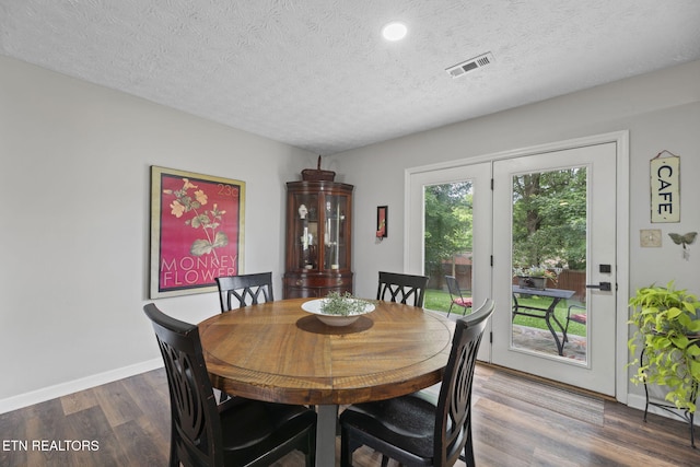 7217 Palermo Rd, Knoxville, TN 37918 - dining space featuring a textured ceiling, wood finished floors, and recessed lighting