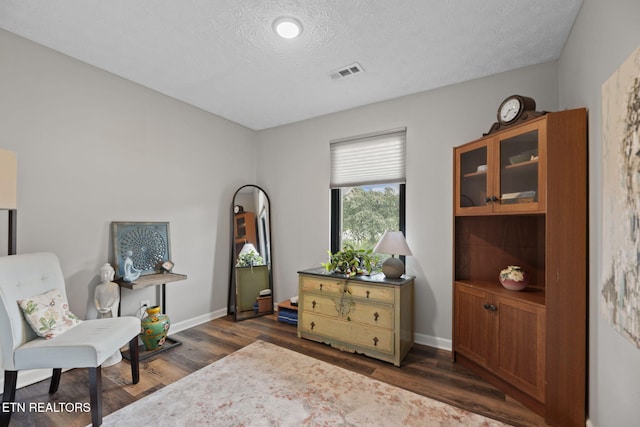 7217 Palermo Rd, Knoxville, TN 37918 - sitting room featuring dark wood finished floors and a textured ceiling