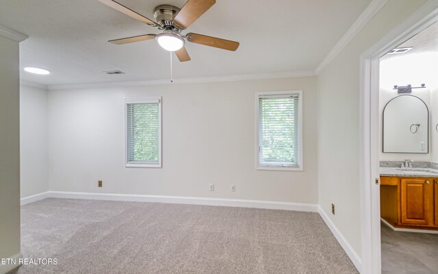 933 Gothic Manor Way, Knoxville, TN 37923 - empty room with light colored carpet, crown molding, and ceiling fan