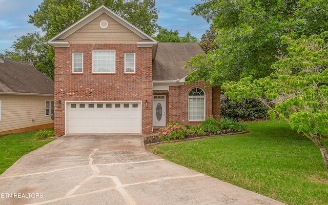 933 Gothic Manor Way, Knoxville, TN 37923 - traditional-style house featuring concrete driveway, a front lawn, brick siding, and an attached garage