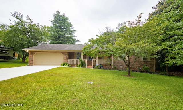 1705 Bobwhite Dr, Maryville, TN 37803 - view of front of home featuring concrete driveway, a porch, a front yard, an attached garage, and brick siding