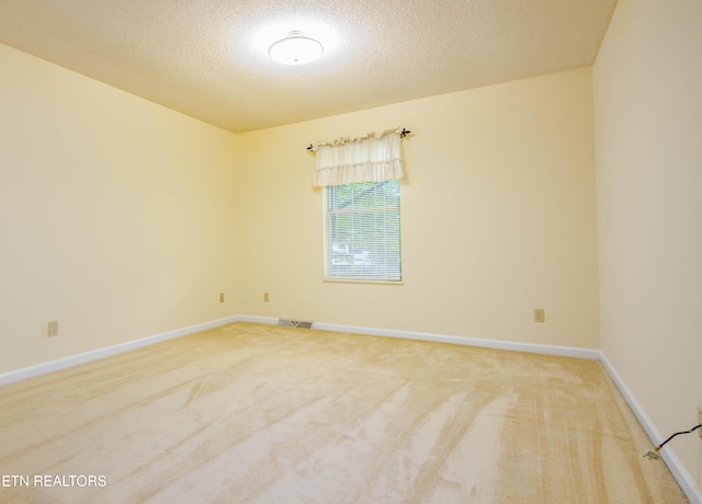 1705 Bobwhite Dr, Maryville, TN 37803 - carpeted empty room featuring a textured ceiling and baseboards