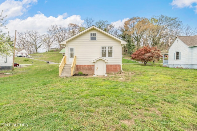 406 S Indiana Ave, Lafollette, TN 37766 - rear view of property with a yard