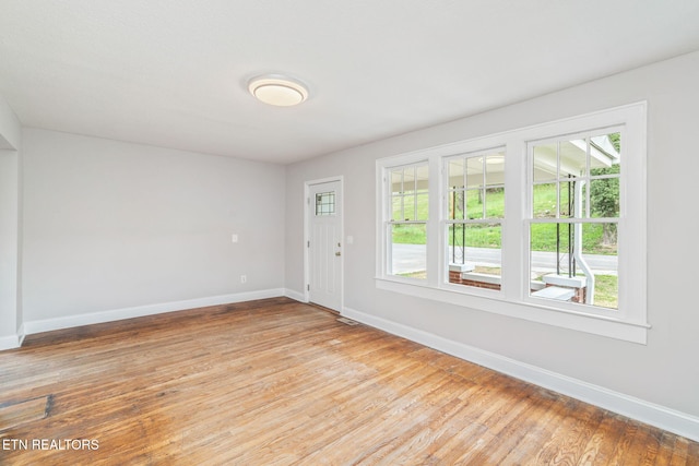 406 S Indiana Ave, Lafollette, TN 37766 - foyer entrance with baseboards and light wood finished floors