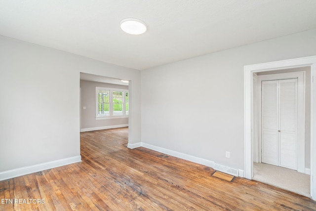 406 S Indiana Ave, Lafollette, TN 37766 - unfurnished room featuring baseboards and wood finished floors