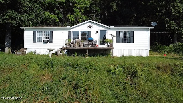 167 Marina Ln, Lafollette, TN 37766 - manufactured / mobile home with a wooden deck