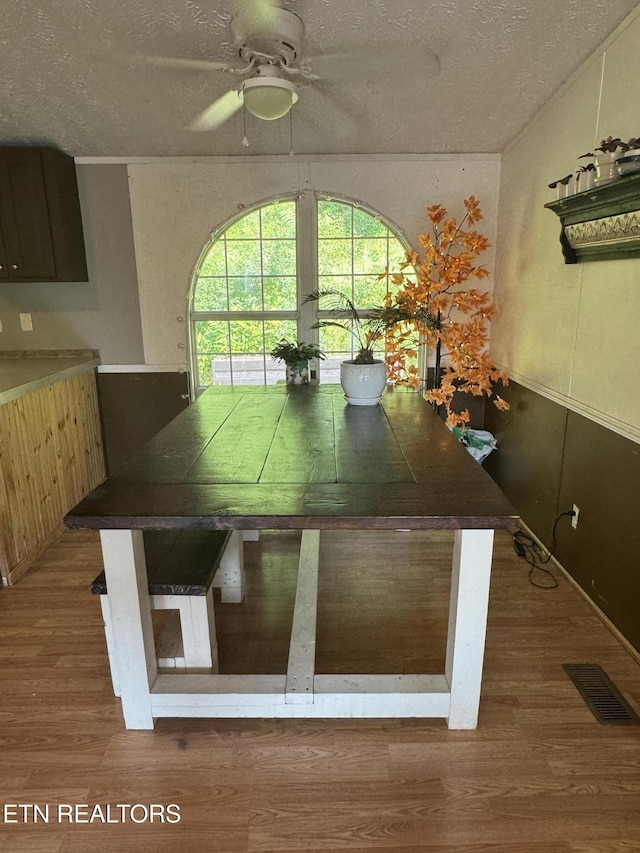 167 Marina Ln, Lafollette, TN 37766 - unfurnished dining area featuring a textured ceiling, ceiling fan, and wood finished floors