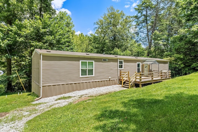 567 Jeffers Rd, Huntsville, TN 37756 - rear view of property with a deck and a yard