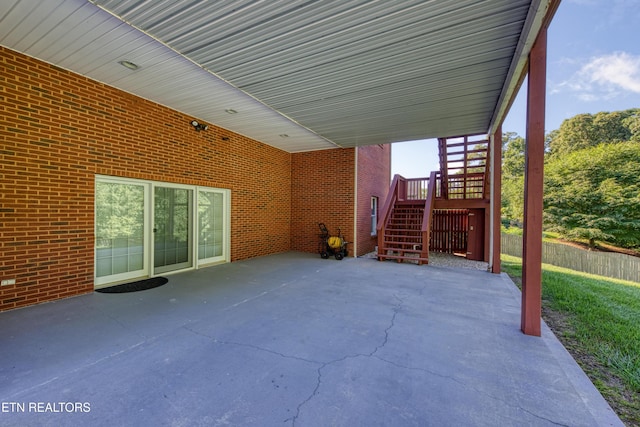 2150 Hirst Cir, Lenoir City, TN 37771 - view of patio / terrace featuring stairs and an attached carport