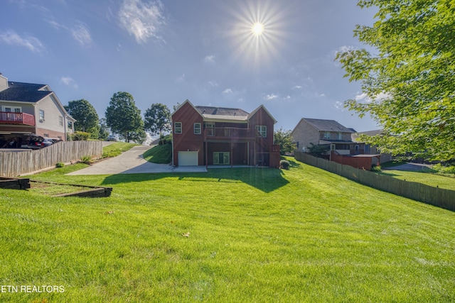 2150 Hirst Cir, Lenoir City, TN 37771 - back of property with a garage and concrete driveway