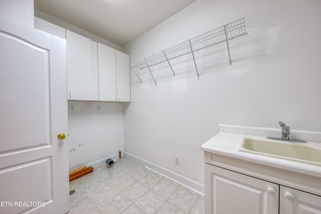 2150 Hirst Cir, Lenoir City, TN 37771 - washroom featuring cabinet space and washer hookup