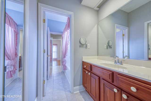 2150 Hirst Cir, Lenoir City, TN 37771 - full bathroom featuring vanity, tile patterned flooring, and shower / tub combo with curtain