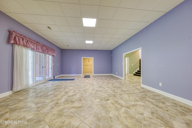2150 Hirst Cir, Lenoir City, TN 37771 - spare room with stairway and a drop ceiling