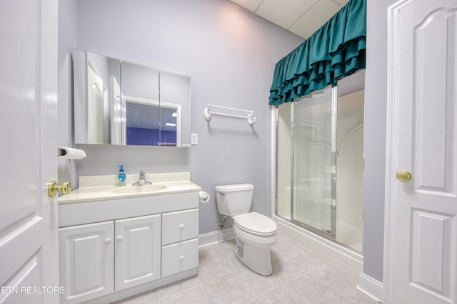 2150 Hirst Cir, Lenoir City, TN 37771 - bathroom with a shower with shower door, vanity, and tile patterned floors