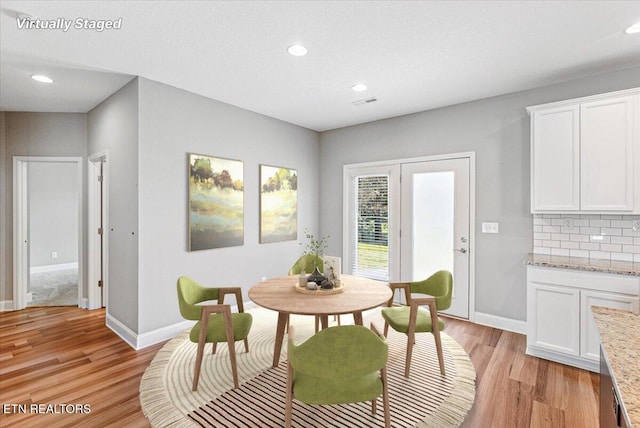 8630 Yellow Aster Rd, Knoxville, TN 37931 - dining room featuring light wood-type flooring and recessed lighting