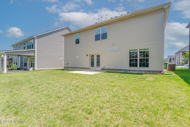 8630 Yellow Aster Rd, Knoxville, TN 37931 - back of house with a lawn and a patio area