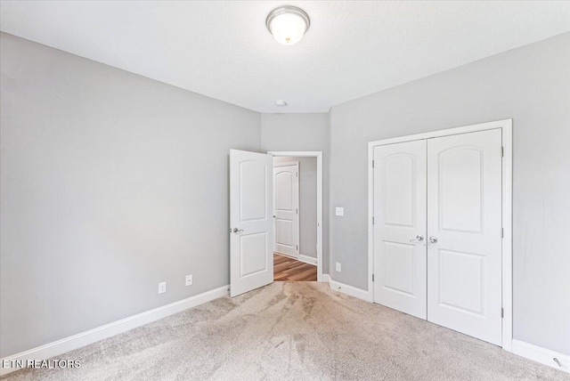 8630 Yellow Aster Rd, Knoxville, TN 37931 - unfurnished bedroom featuring carpet flooring and a closet