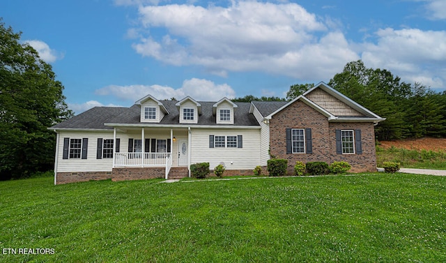 200 W Park Cir, Decatur, TN 37322 - view of front facade with covered porch, a front yard, and roof with shingles